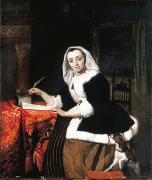 An elegant lady writing at her desk, with a dog beside her