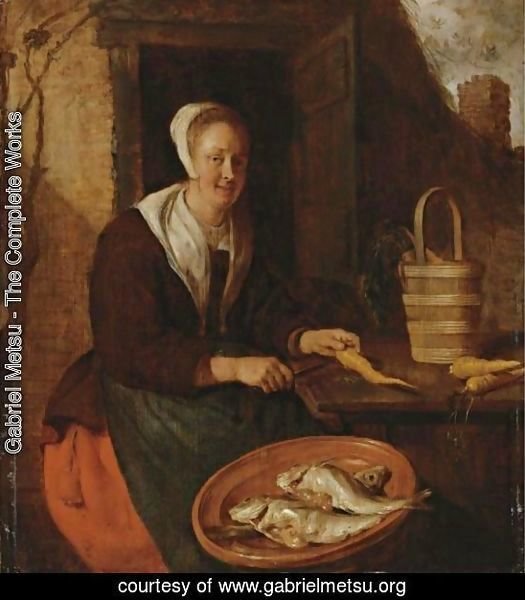 A Kitchenmaid Preparing Carrots
